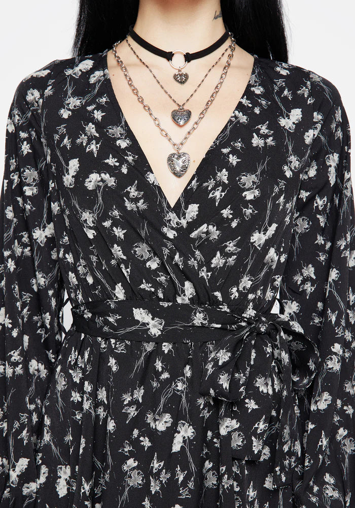 Vestido mini cruzado con estampado floral