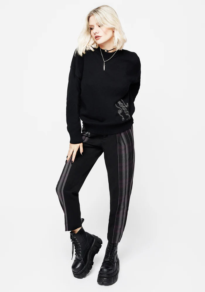 Jersey de punto con daga negra bordada