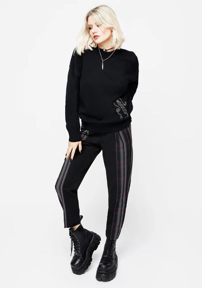 Jersey de punto con daga negra bordada