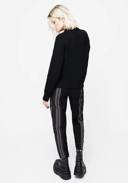 Jersey de punto con daga negra bordada