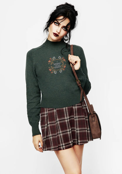 Jersey de punto bordado con cuello alto