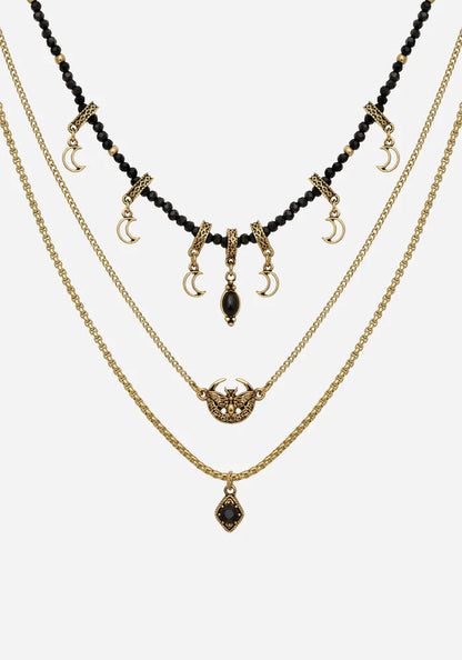 Collar en capas de luna y polilla doradas
