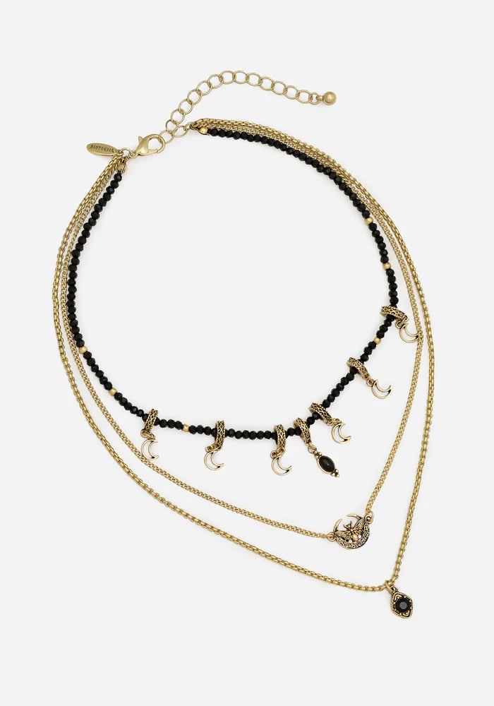 Collar en capas de luna y polilla doradas