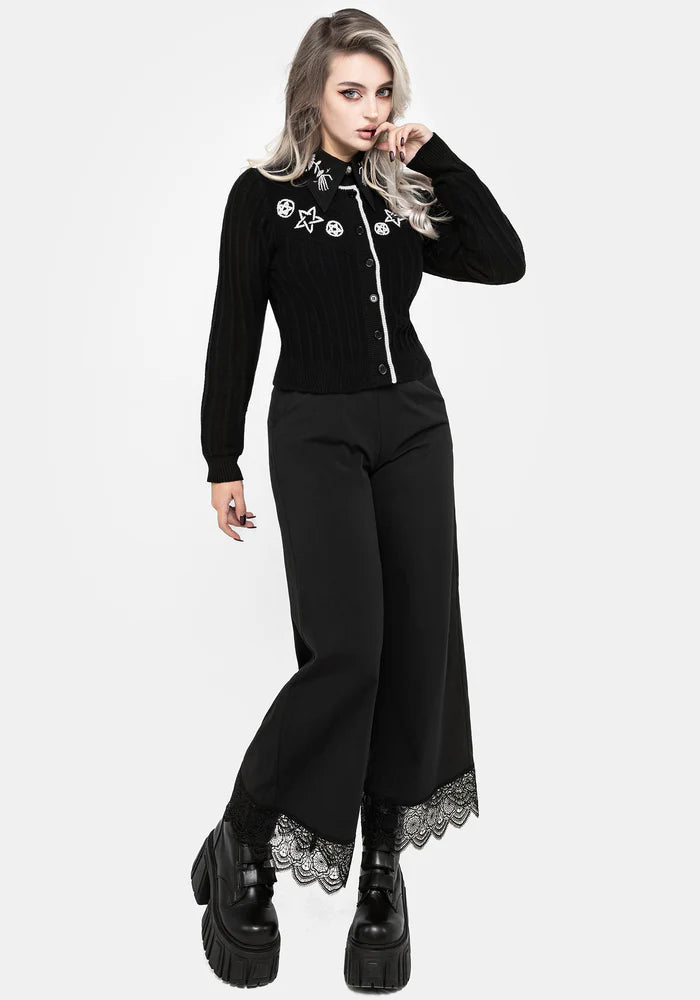 Cárdigan bordado con pentagrama