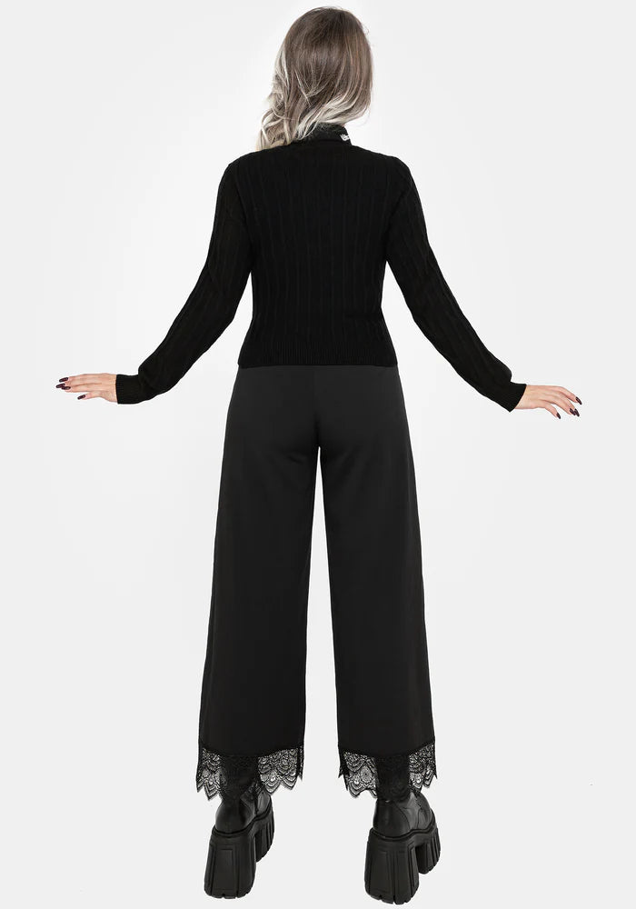 Cárdigan bordado con pentagrama