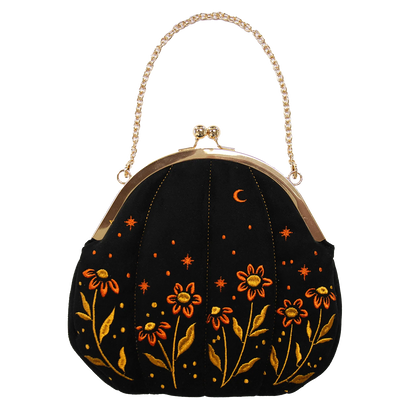 Bolso de terciopelo bordado con forma de calabaza en color negro.