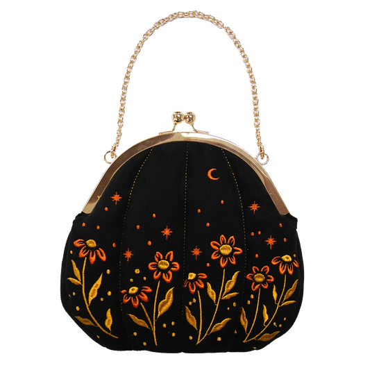 Bolso de terciopelo bordado con forma de calabaza en color negro.